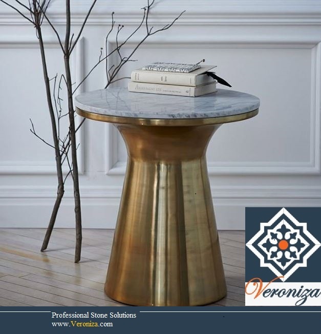 white stone table with bronze